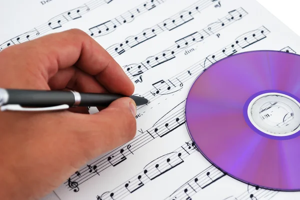 stock image Cd or dvd drive and musical notes