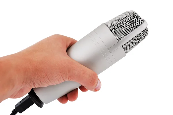Micrófono en la mano — Foto de Stock