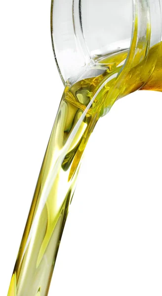 Sunflower oil is poured from a pitcher. — Stock Photo, Image
