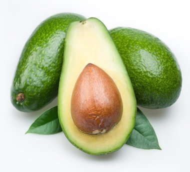 Avocado with leaves on a white background clipart