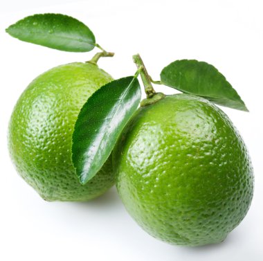 Lime with leaves on a white background clipart