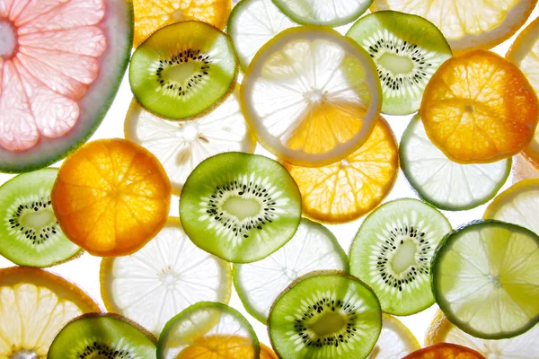 Brighten citrus slices on a white — Stock Photo, Image