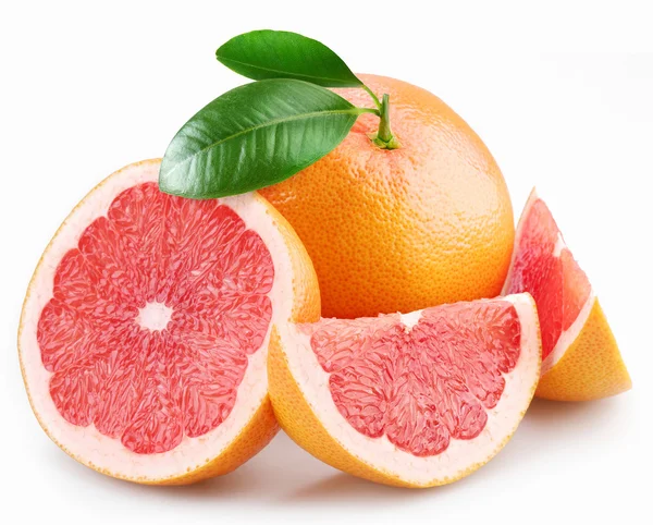 Grapefruits and segments with a leaves on a white background — Stock Photo, Image