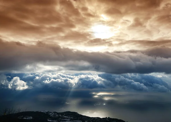 stock image Clouds above a sea