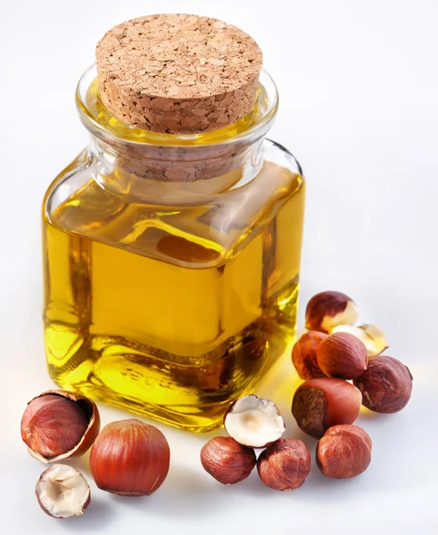 Filbert oil with nuts — Stock Photo, Image