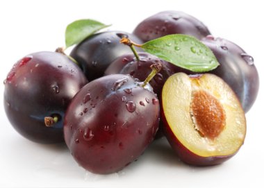 Plums on a white background clipart