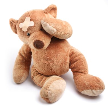 Ill teddy bear with plaster on its head clipart