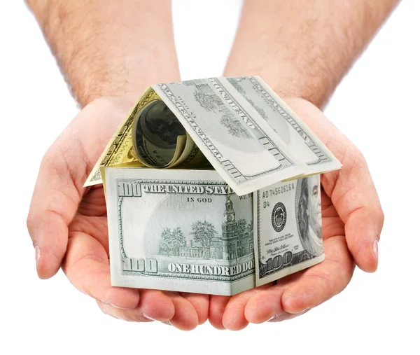 Δολάριο σπίτι στα χέρια απομονωθεί σε λευκό. — Φωτογραφία Αρχείου