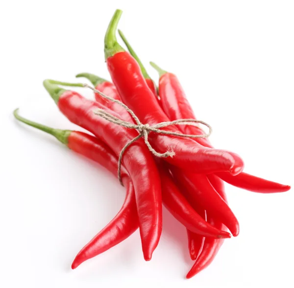 Pods spicy red chilli peppers on white background — Stockfoto
