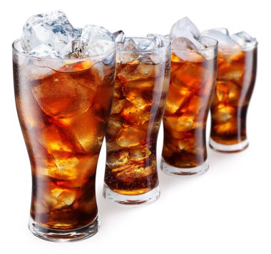Glasses with cola and ice cubes