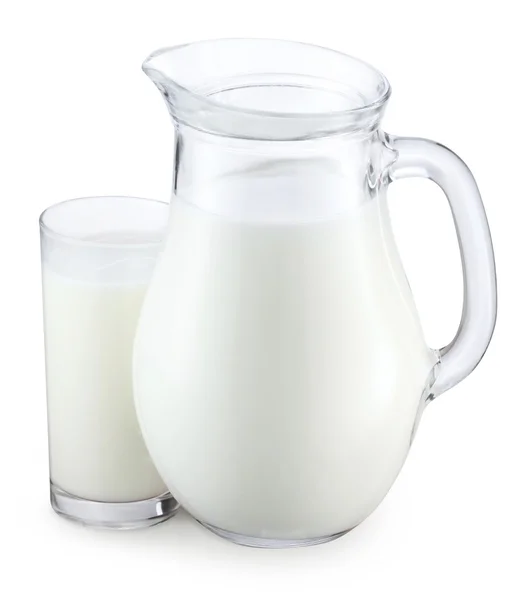 Кувшин и стакан молока . — стоковое фото