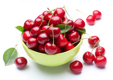 Bowl with ripe cherries. clipart