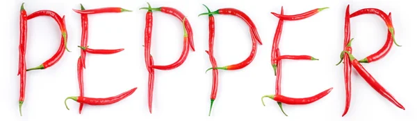 Slovo "pepř" je napsáno na bílé chilli papričky — Stock fotografie