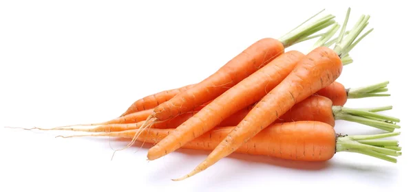 Ripe fresh carrots on a white background. — Stock Photo, Image