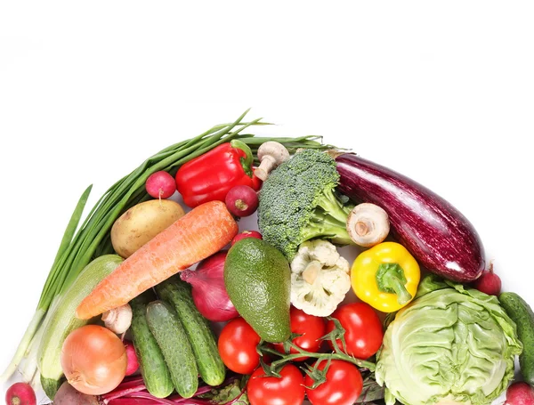 Con verduras en un semicírculo. Aislado sobre fondo blanco — Foto de Stock