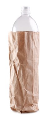 Empty plastic bottle in a paper bag on white background. clipart