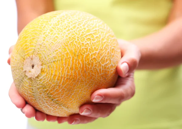 Melon w ręce kobiety. — Zdjęcie stockowe