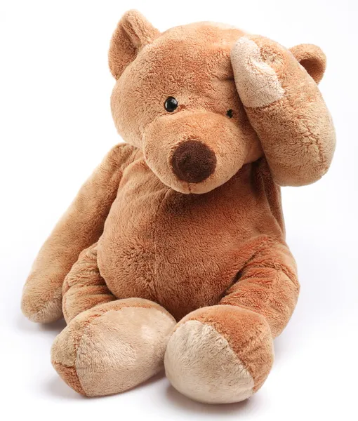 Teddy bear in een punt van zorg. geïsoleerd over Wit. — Stockfoto