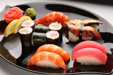 Set of Japanese sushi on a plate clipart