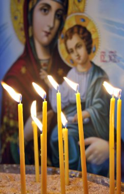 Candles in a Christian Orthodox church clipart