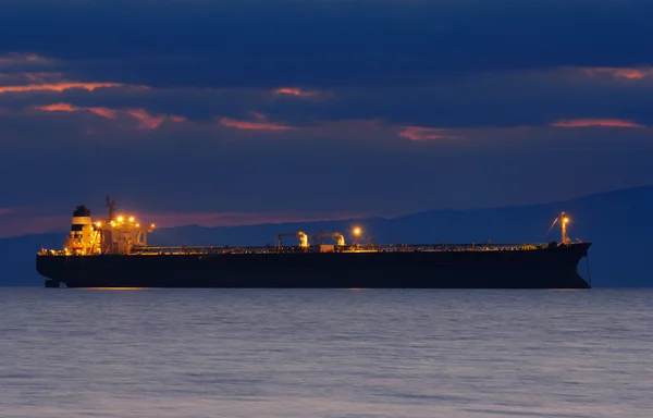 Commercial ship at dusk — Stock Photo, Image
