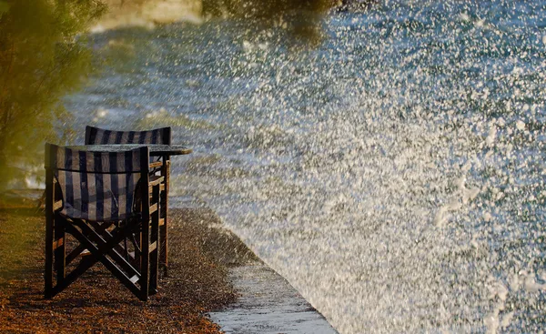 Tables and waves splash — Stock Photo, Image