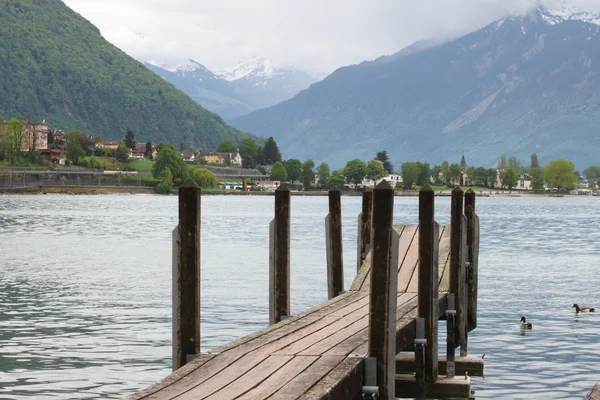 Planked footway on mountain lake in Swiss — Stock Photo, Image