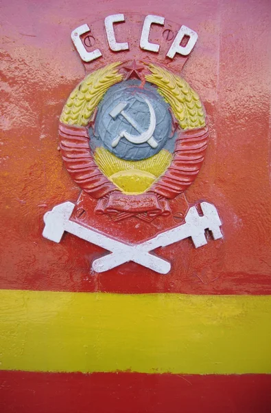 stock image The State Emblem of the USSR on a wall of the railway car