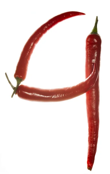 Number "4" made of chili peppers on white background — Stock Photo, Image