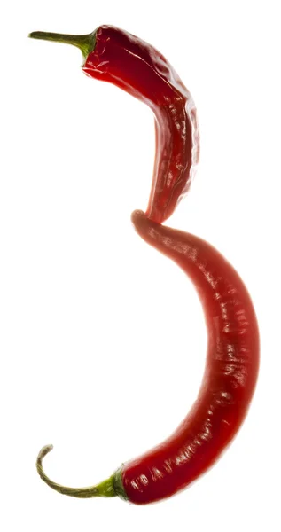 Nummer "3" gemaakt van chili peppers op witte achtergrond — Stockfoto