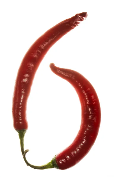 Nummer "6" gemaakt van chili peppers op witte achtergrond — Stockfoto