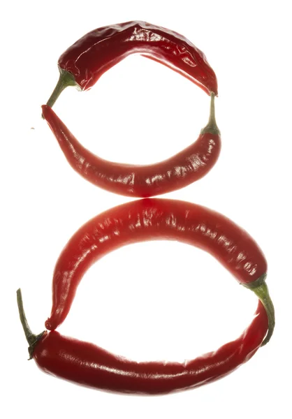 Number "8" made of chili peppers on white background — Stock Photo, Image