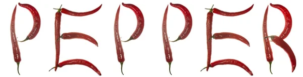 Red hot chilli peppers spelling the word "pepper" horizontally — Stock Photo, Image