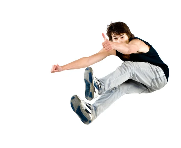 Very vigorous jump of the young guy isolated — Stock Photo, Image