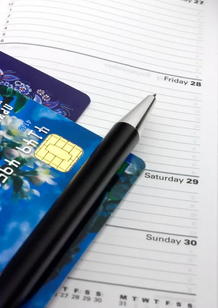Appointment book and credit cards — Stock Photo, Image