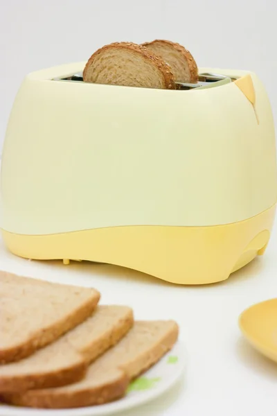 Toaster and bread Stock Photo