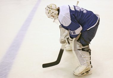 Goalie-hockey player is on the ice clipart