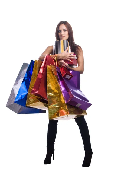 Pretty young woman with bags of purchases — Stock Photo, Image