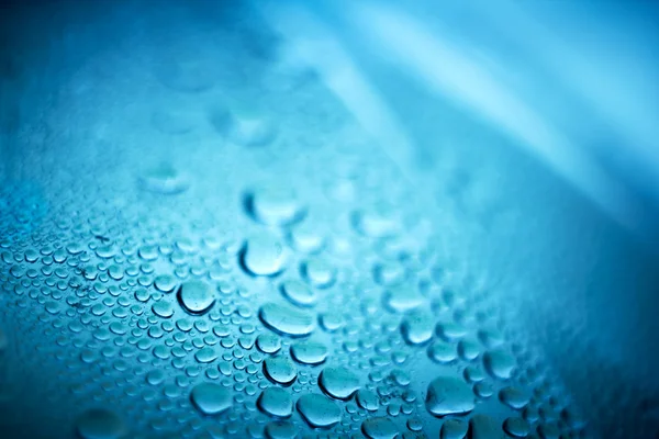 Abstract blue background. Liquid on dirty glass. — Stock Photo, Image