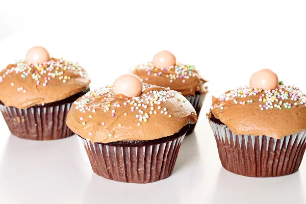 Yummy chocolate cupcakes isolated on white — Stock Photo, Image