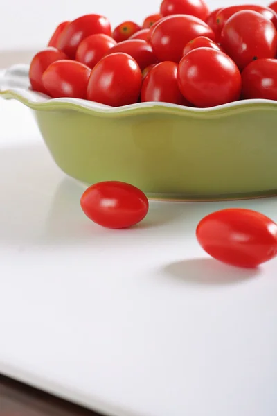 Grape tomatoes on white — Stock Photo, Image
