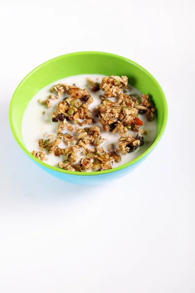 stock image Granola cereal with milk on white vertical