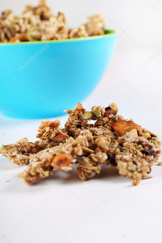 Shot of gourmet granola in blue bowl vertical