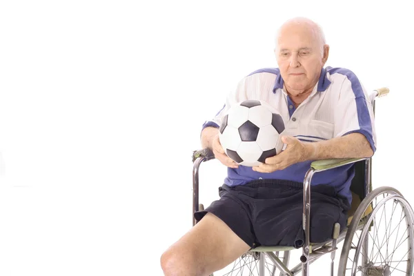 Handicap elderly man with soccer ball — Stock Photo, Image