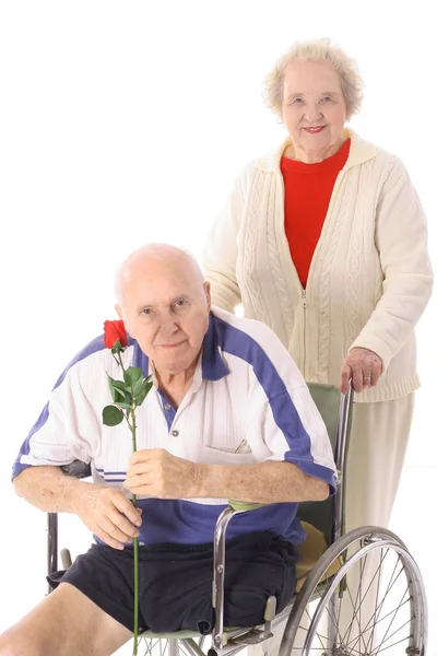 Handikapp senior med fru — Stockfoto