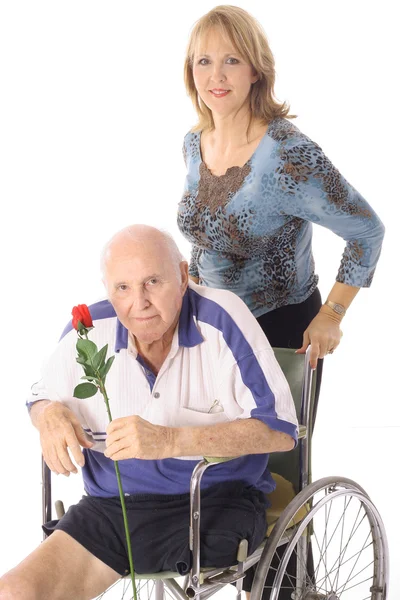 Tiro de um deficiente homem idoso com mulher mais jovem — Fotografia de Stock