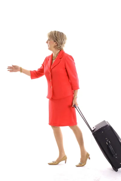 Woman walking with luggage — Stock Photo, Image
