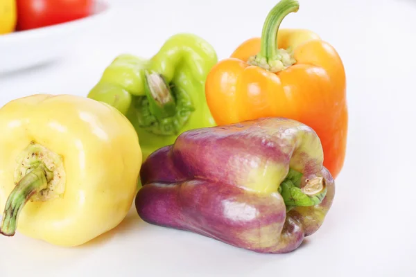 Fialová, žlutá, oranžová & zelená baby bell peppers — Stock fotografie