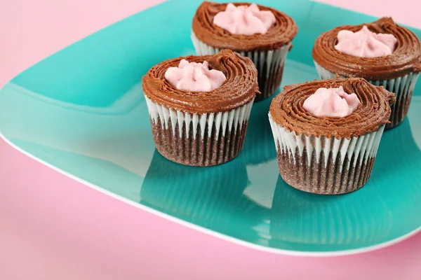 Raspberry filled chocolate cupcakes angle — Stock Photo, Image