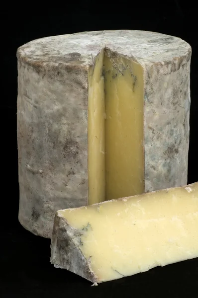Caverna MAtured Cheddar queijo fatiado — Fotografia de Stock